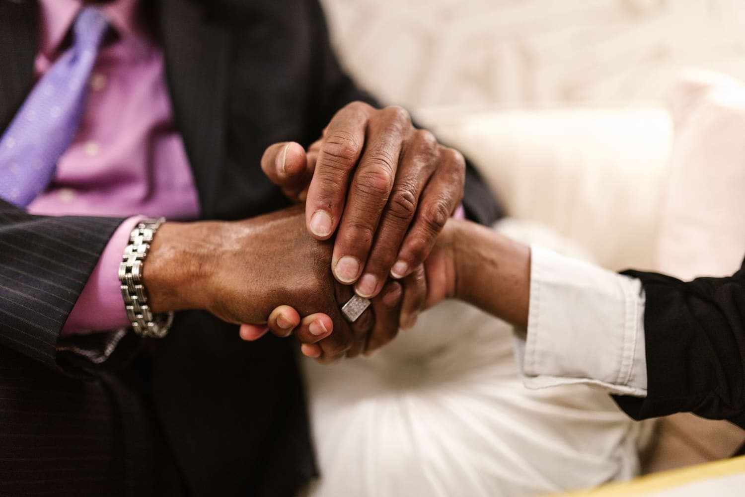 Care provider shaking hands with a council commissioner after winning a home care contract